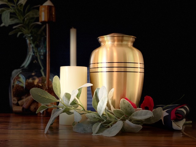 Photo of a cremation urn and US flag 